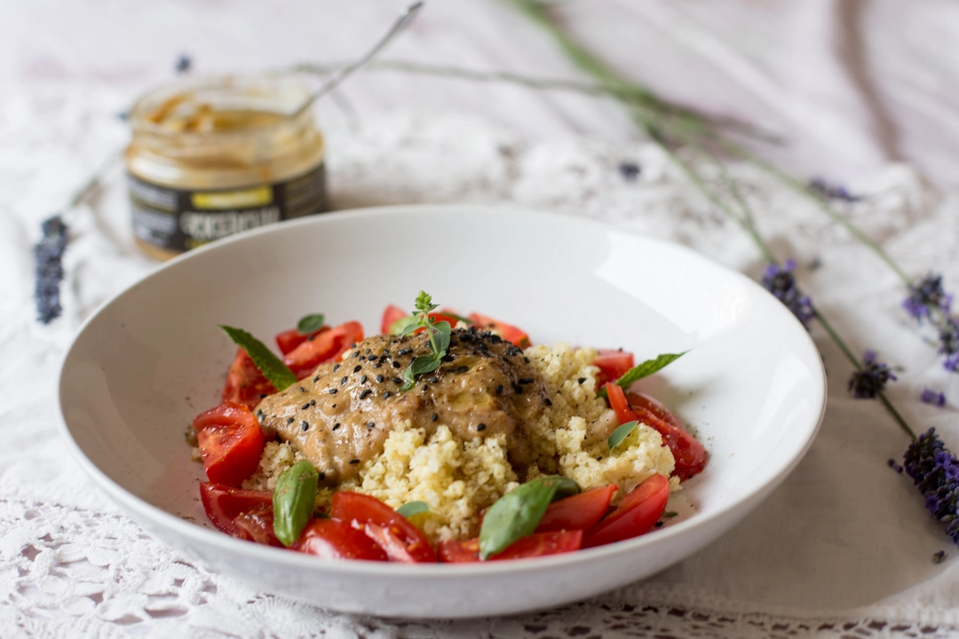 Recipe:  Millet vegab bowl with hummus of cicerchie, datterini and lavender