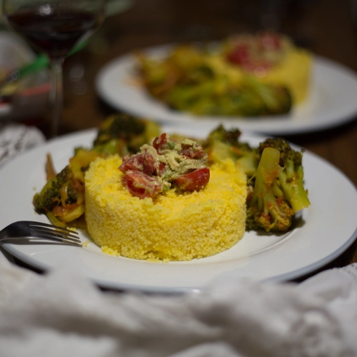 Yellow rice and green vegetables